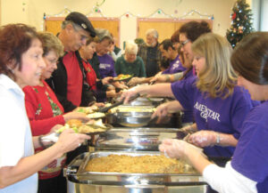 Seniors Ameristar serving Ana Buckman-Hart and other seniors