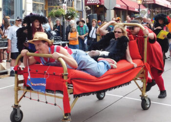 Famous brass bed races on Main Street!