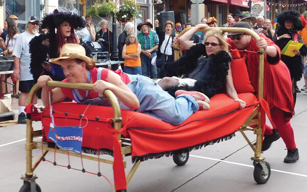 Famous brass bed races on Main Street!