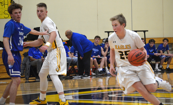 Eagles boys B-Ball team gallops over Mustang rivals